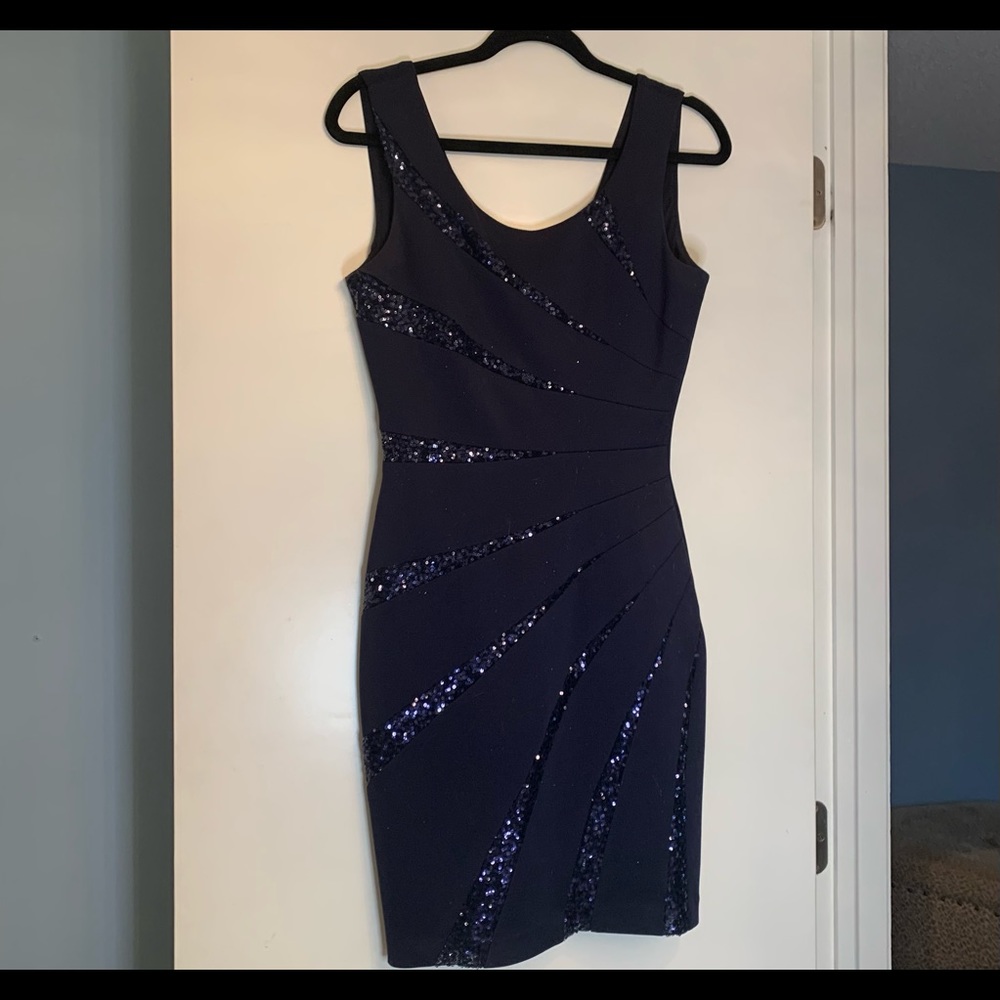 Navy blue with sequins guess size 6 dress. Worn once.
